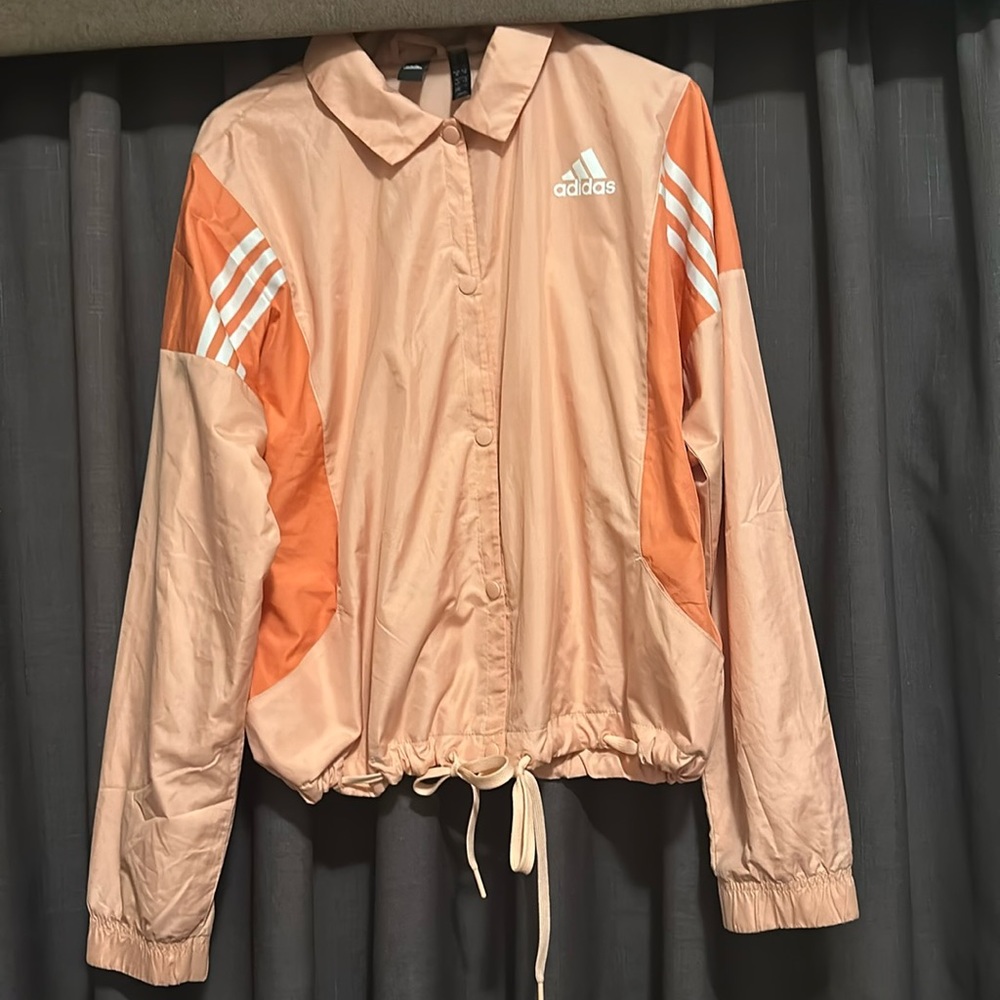 Pink coral adidas windbreaker jacket with draw string at bottom